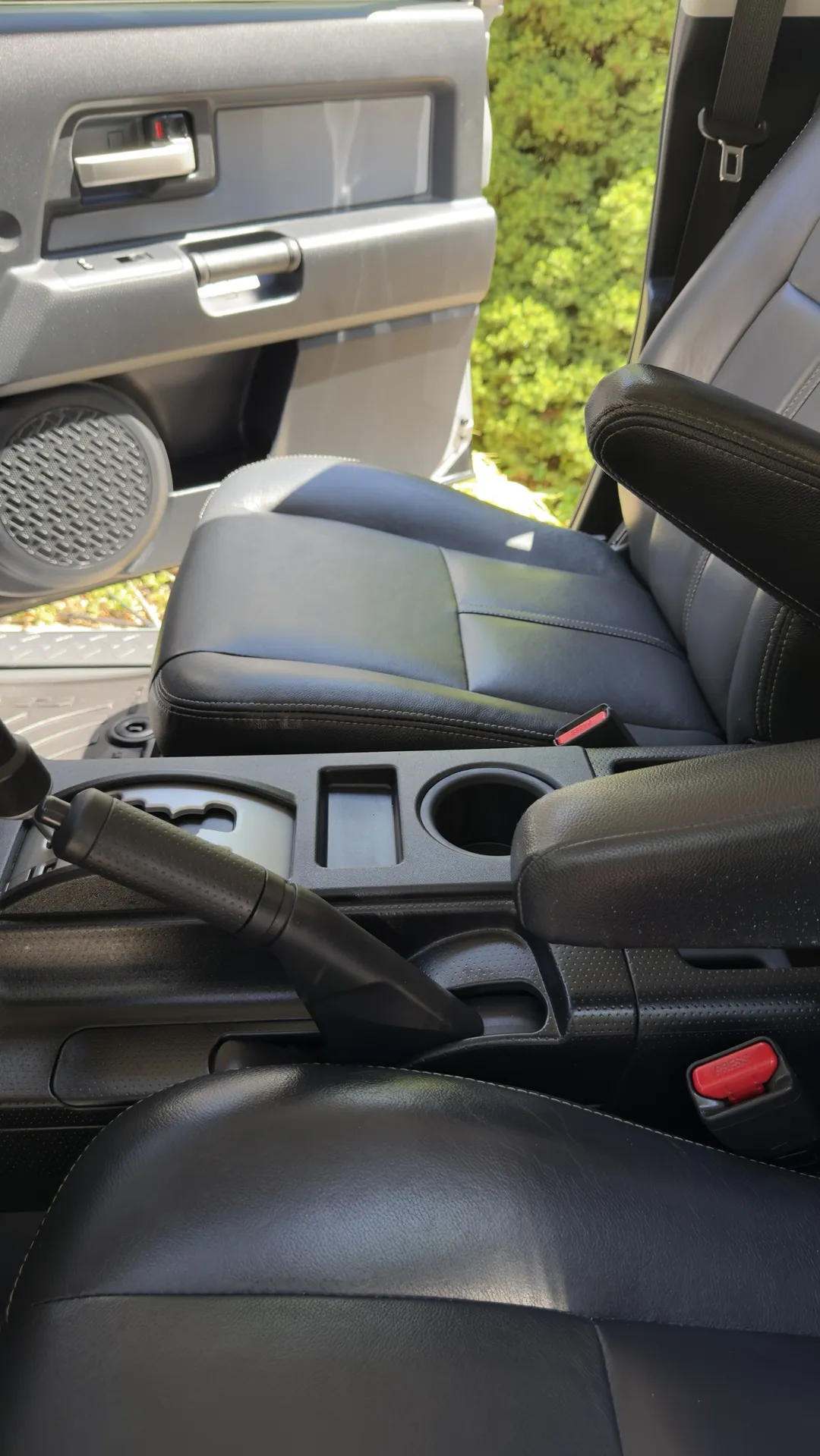 Toyota FJ Cruiser center console and cup holders after an interior detail
