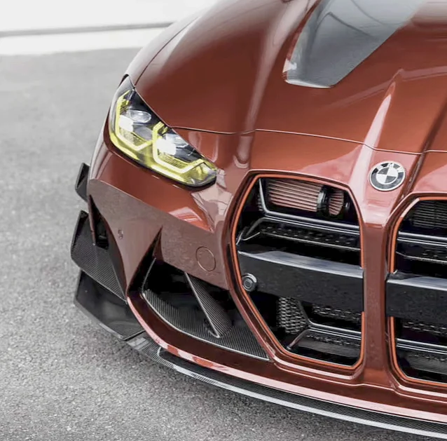 Red BMW M3 front end with carbon splitter