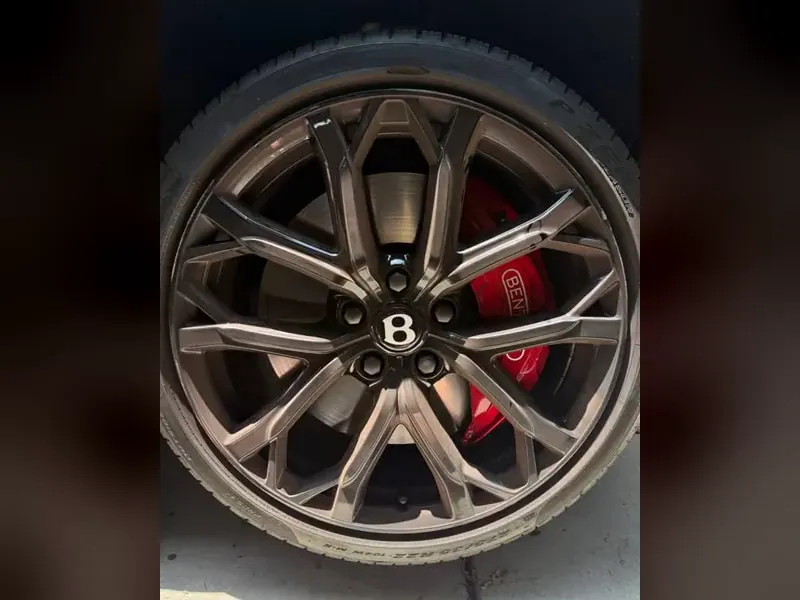 Bentley wheel before and after curb rash repair