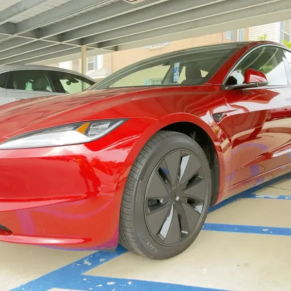 Red Tesla Model 3 protected with SunCoat