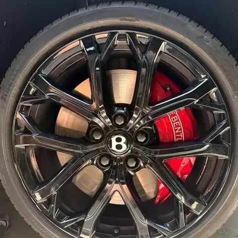 Bentley wheel after curb rash repair