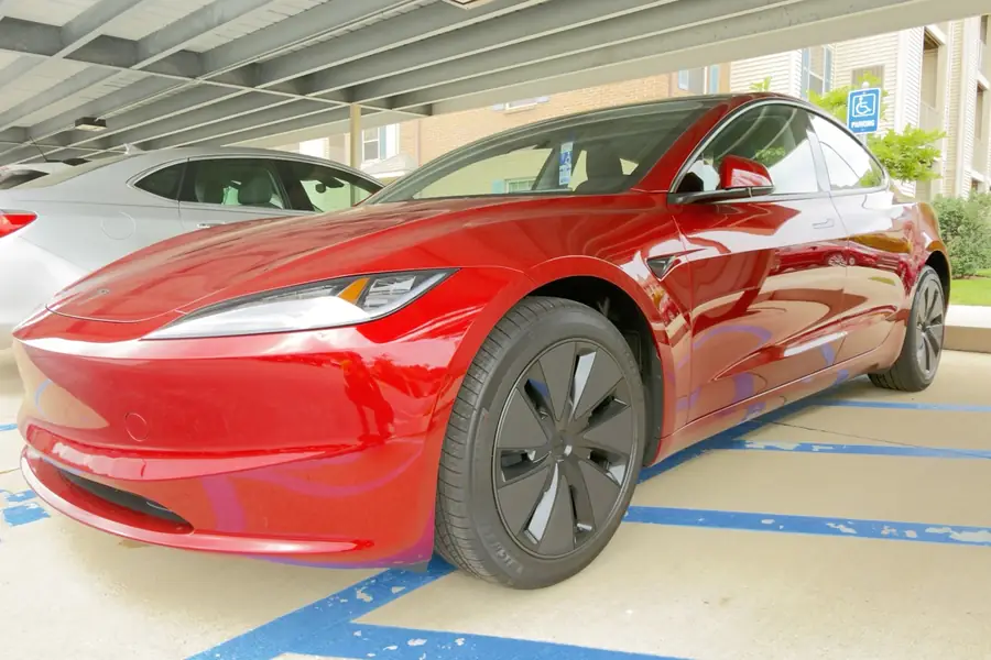 Red Tesla Model 3 after SunCoat ceramic coating in Muskegon, MI