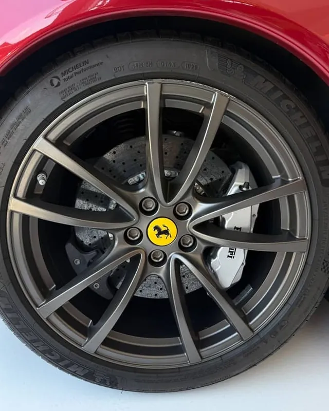 Ferrari wheel before curb rash repair