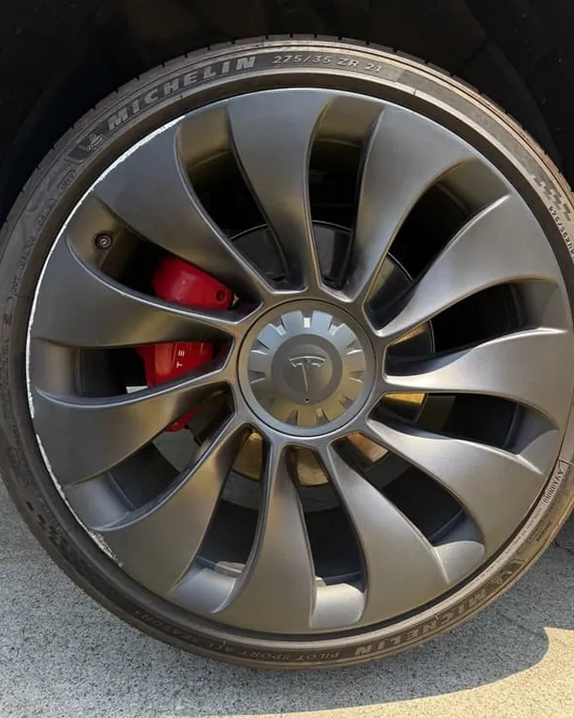 Tesla Model Y wheel before curb rash repair